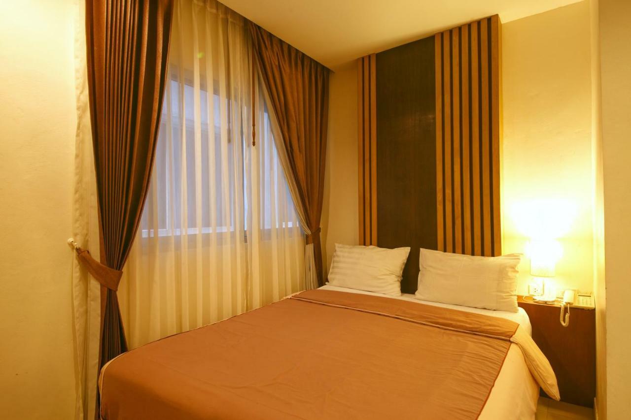 Tropical Sunset Hotel Patong Exterior photo