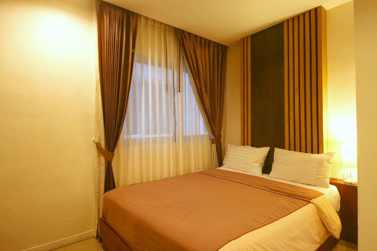 Tropical Sunset Hotel Patong Exterior photo